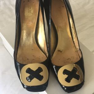 Black shoes with gold tip